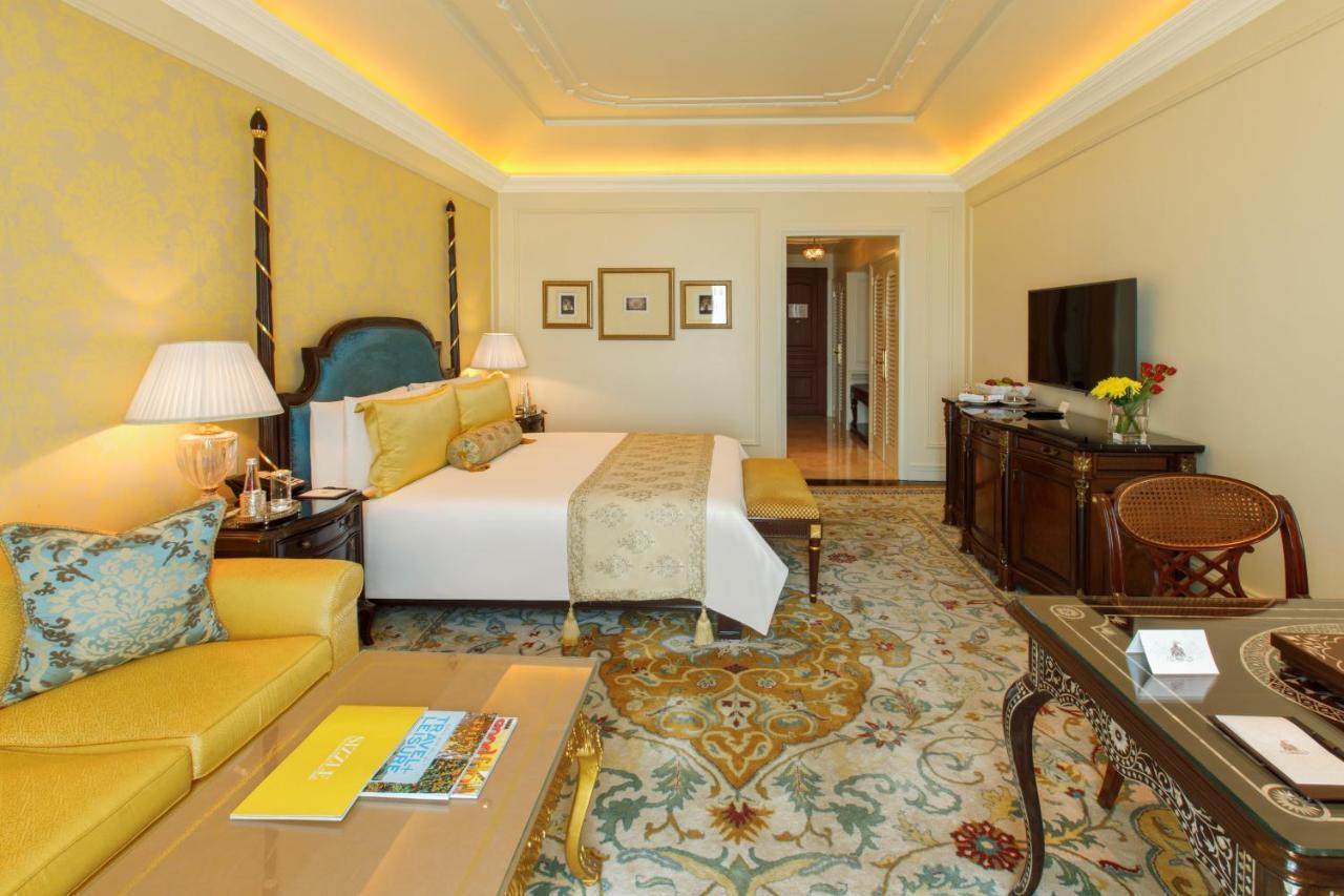 The Leela Palace New Delhi Exterior photo A room at the Taj Mahal Palace